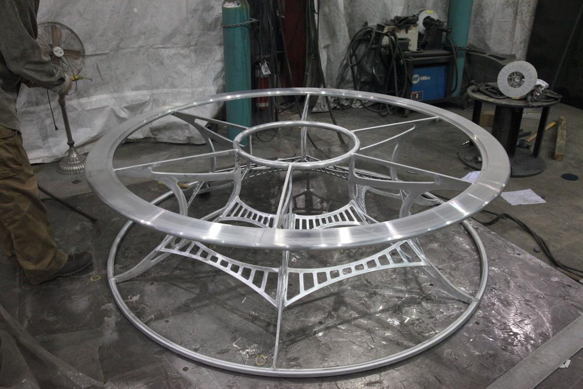 Contortionist aluminum table